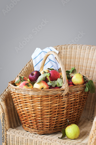 Basket full of ripe organic apples