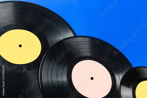 Retro vinyl record on blue background