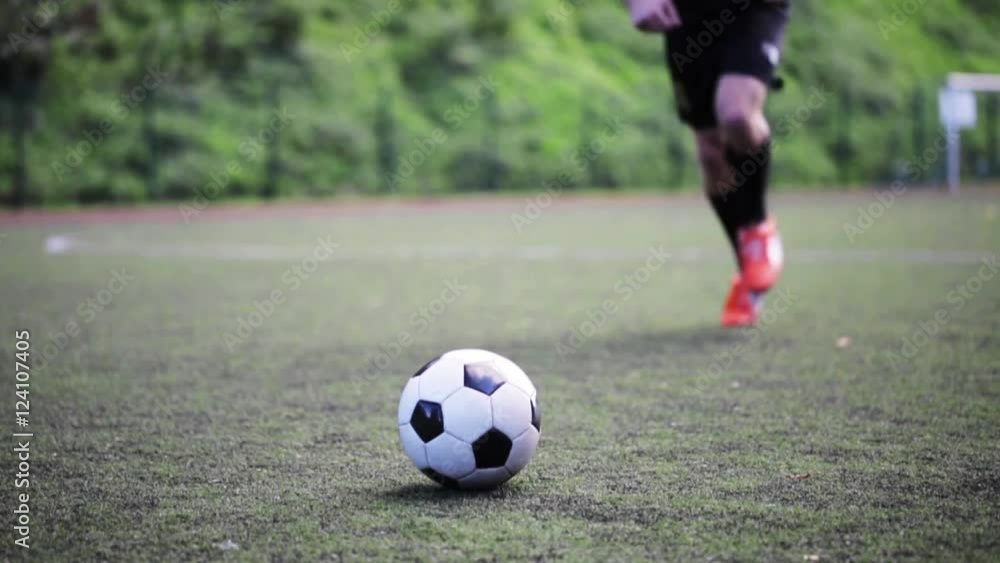 soccer player playing with ball on field soccer player playing with ball on field