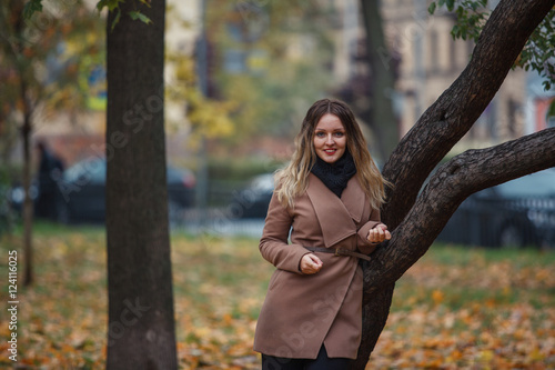 Beautiful girl in autumn Park