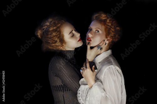  Portrait of two Young girls fashion models with gorgeous curly