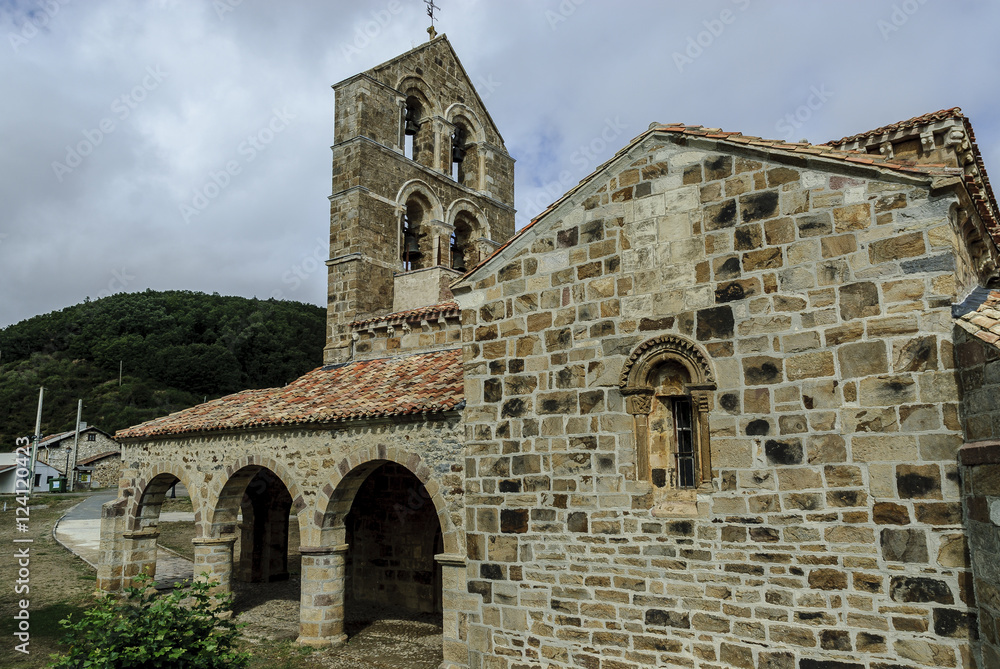 sight of the Romanesque collegiate church of San Salvador in Cantamuda, Palencia, Castile and León, Spain sight of the Romanesque collegiate church of San Salvador in Cantamuda, Palencia, Castile and León, Spain