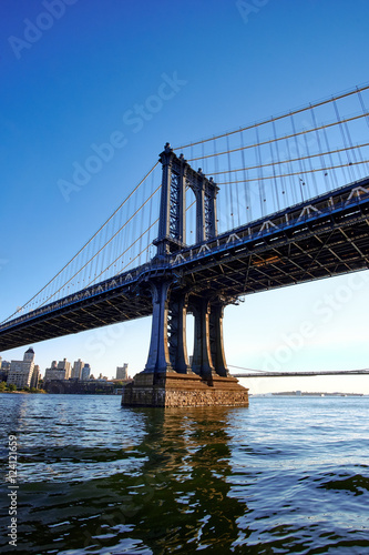 Closeup of one of the towers that supports the Manhattan suspension bridge between New York City and Brooklyn  in dusk