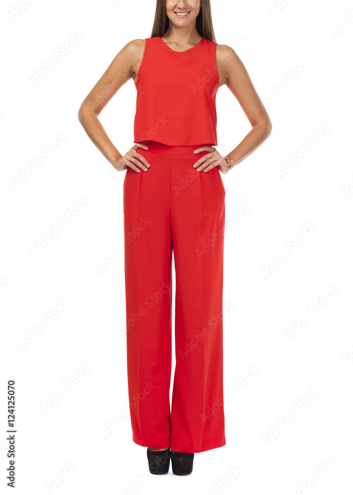 Happy brunette woman in red pantsuit
