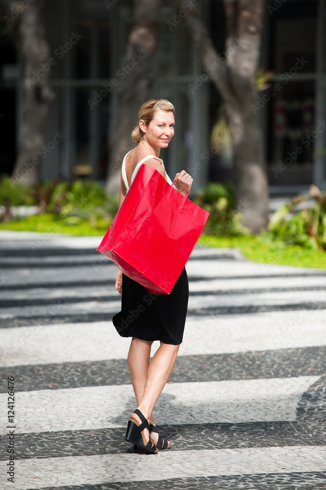 Woman with shopping bags at Lincoln Road outdoor mall