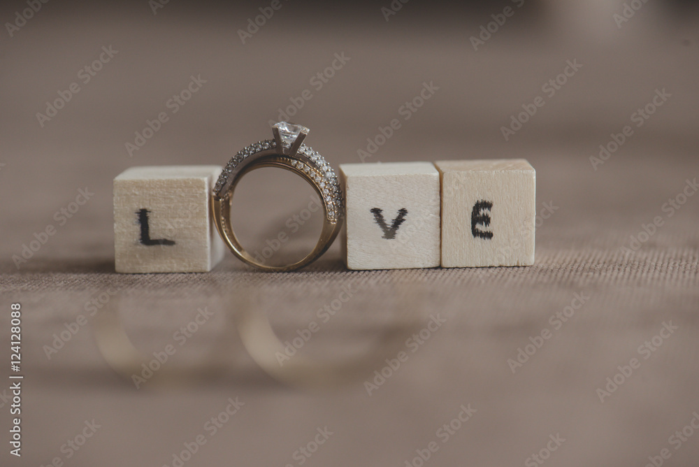 Wedding and engagement rings with inscription love Wedding and engagement rings with inscription love
