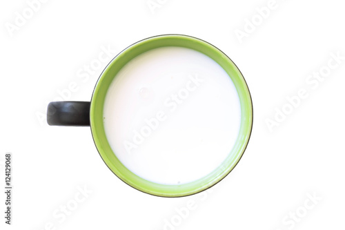 Top view of glass milk green and white in simple glass. Isolated on white background. Round copy space in center.