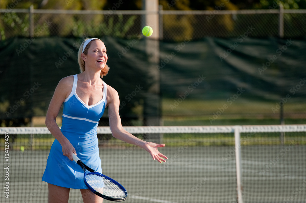 Blond Woman Playing Tennis
