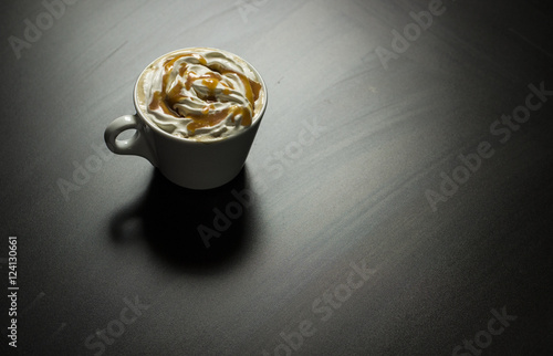 cup of caramel cappuccino coffee