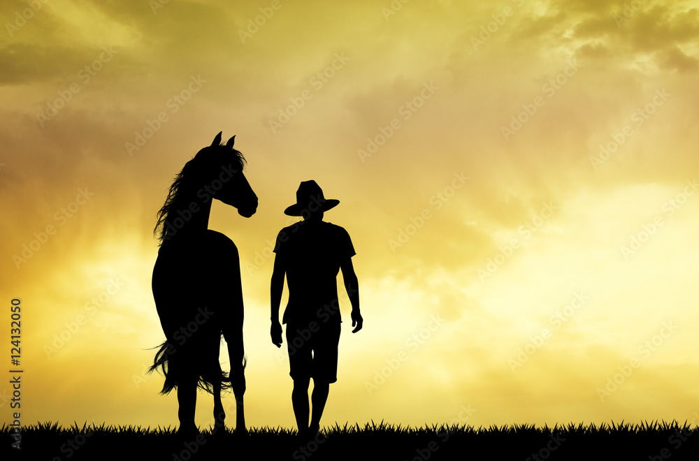 man and horse at sunset