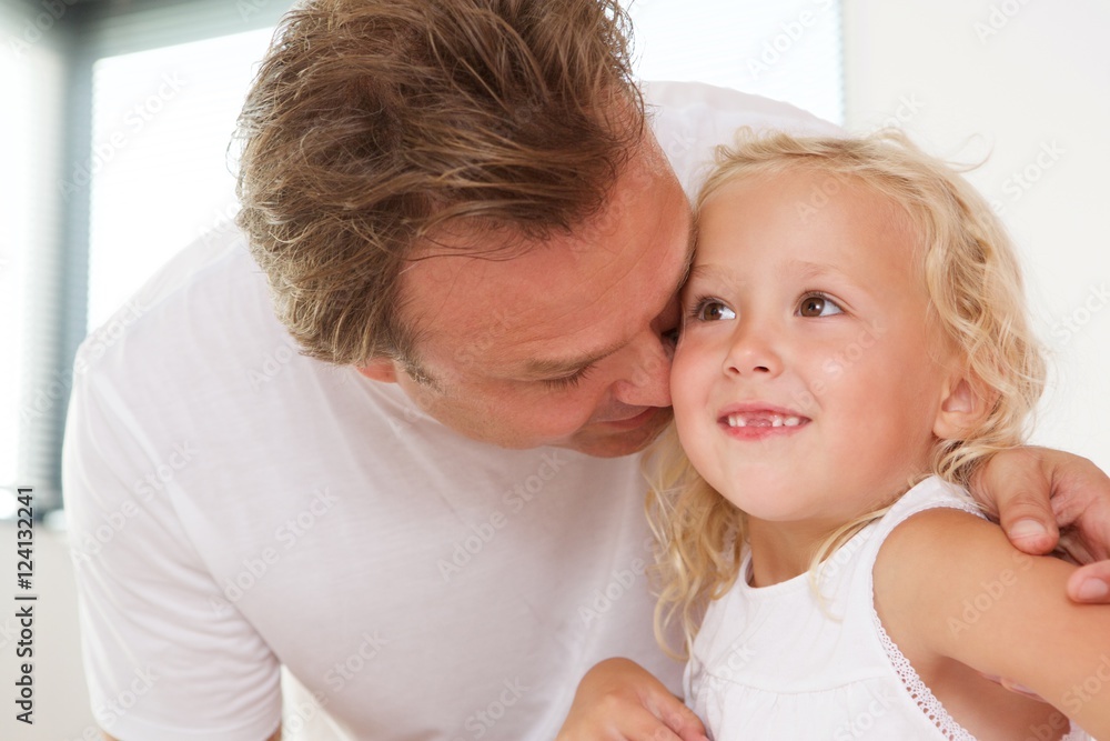 Loving father with his cute little daughter at home Loving father with his cute little daughter at home