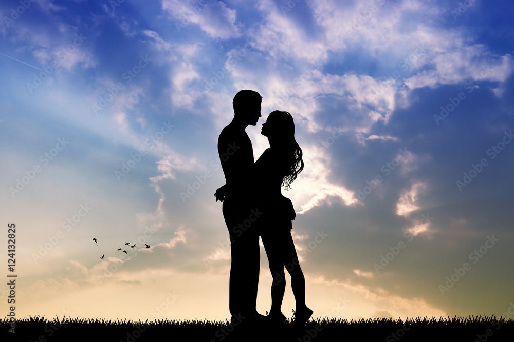 lovers kissing at sunset lovers kissing at sunset