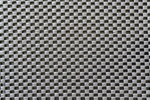 The surface of the sponge black on black background.