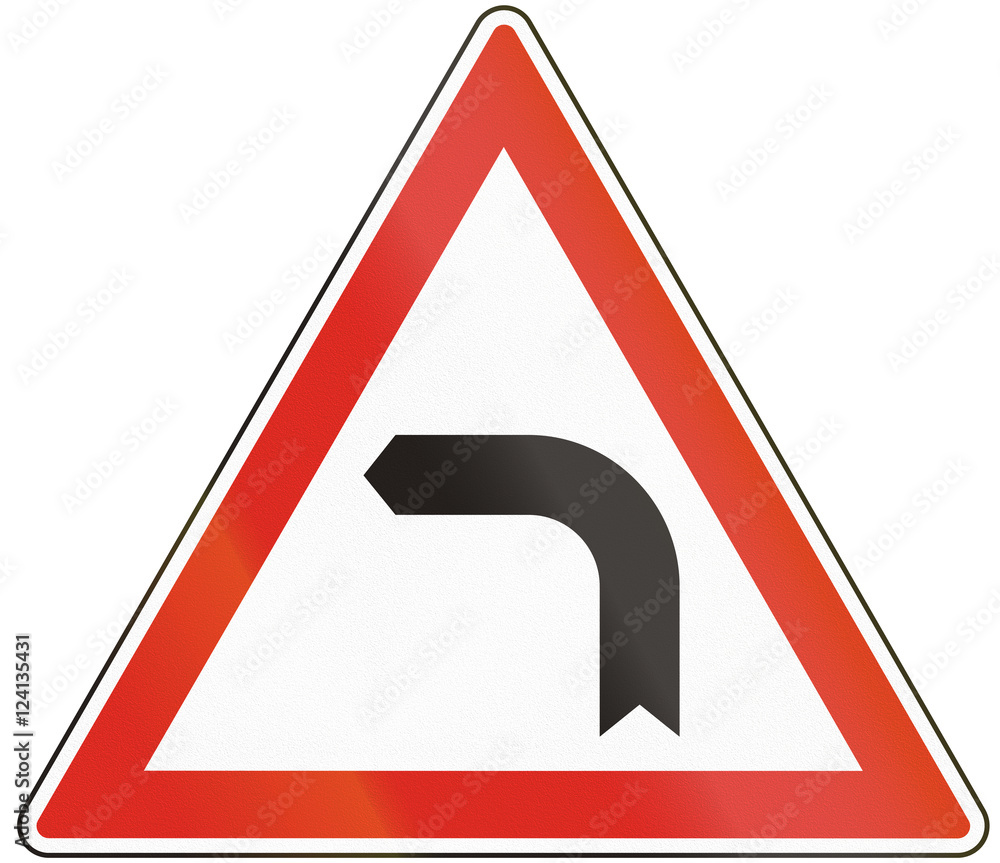 Hungarian warning road sign - Bend to left