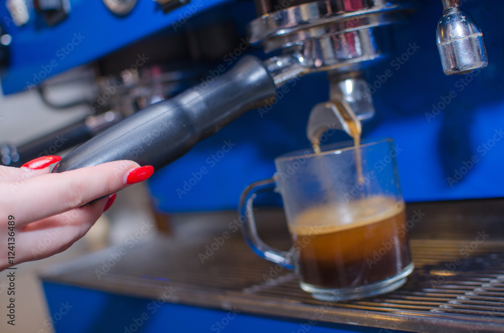 Woman making coffee