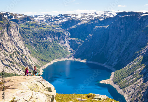 Young women hiking on Trolltunga