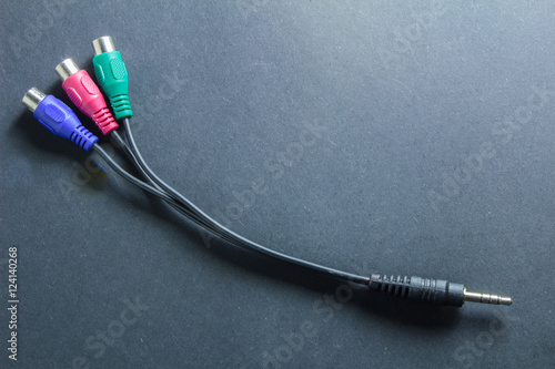 electrical cord tulip minijack on a dark background