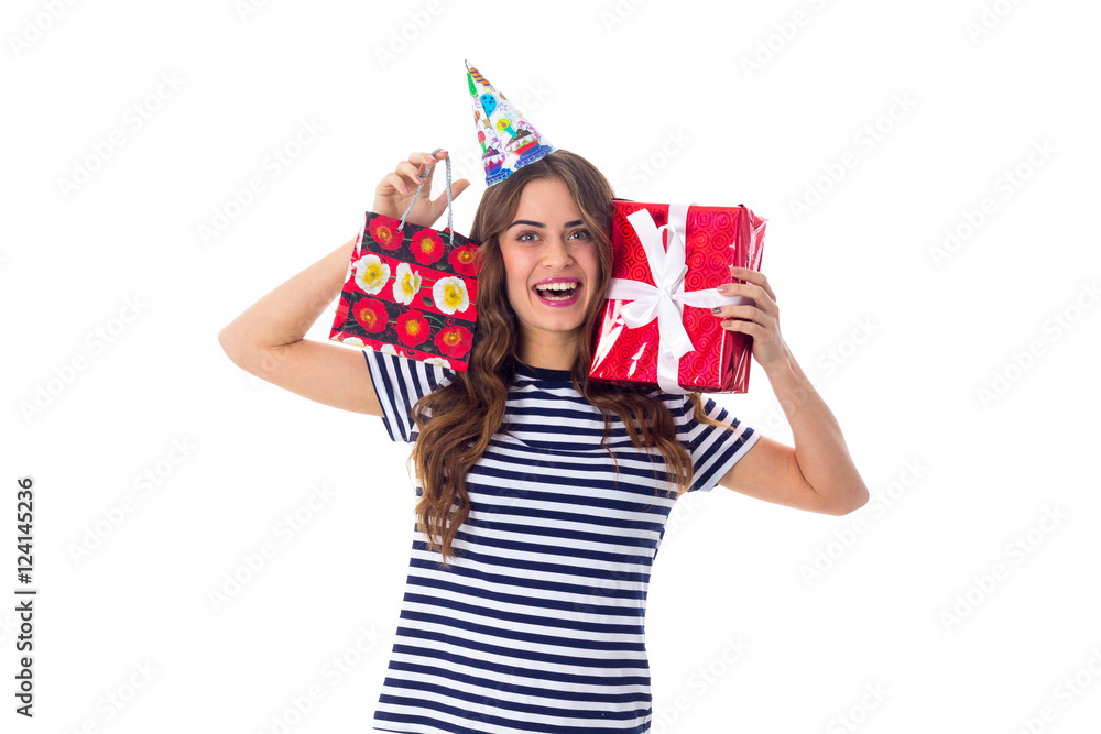 Woman in celebration cap holding presents Woman in celebration cap holding presents
