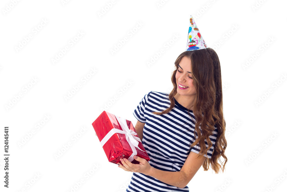 Woman in celebration cap holding a present 