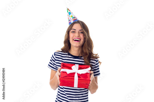 Woman in celebration cap holding a present 
