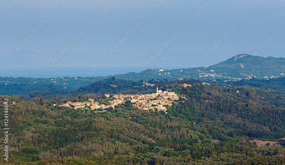 Landscape with a distant greek village