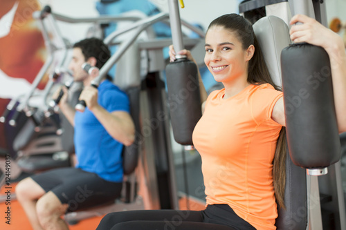 Young couple in the gym