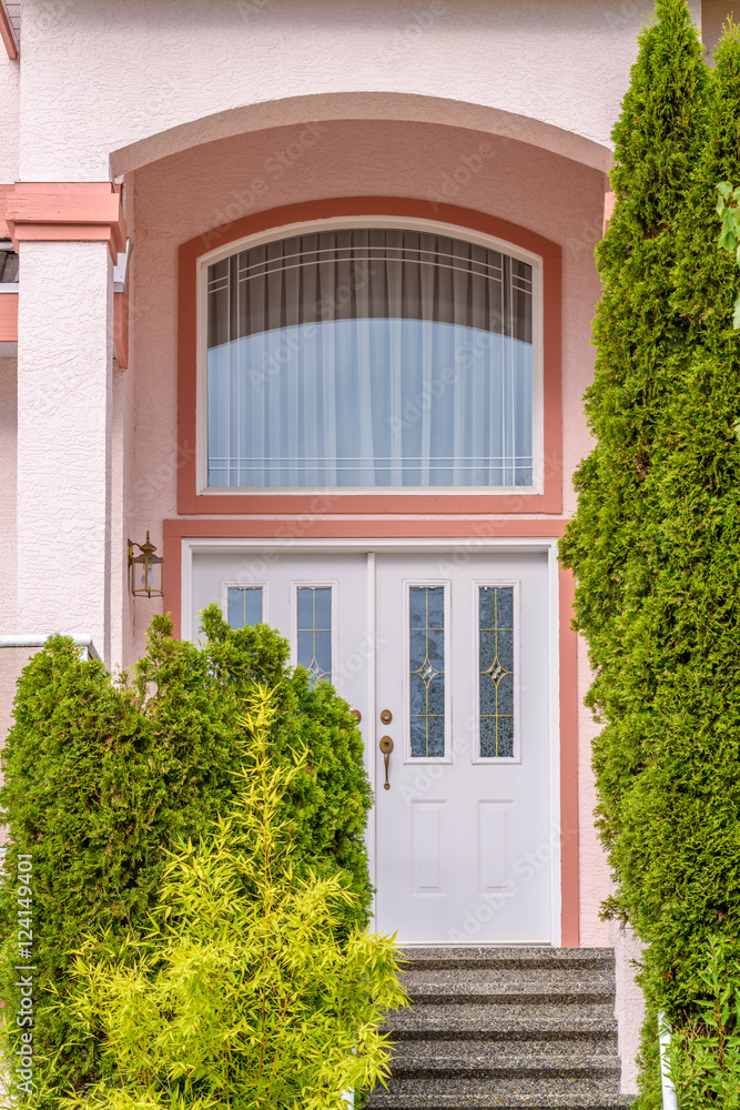 A nice entrance of a luxury house over outdoor landscape