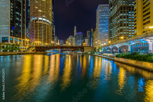 Chicago River skyline with urban skyscrapers at night  IL  USA