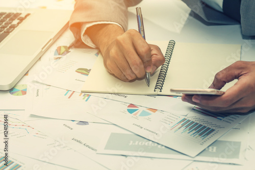 Businessman show analyzing report, business performance concept