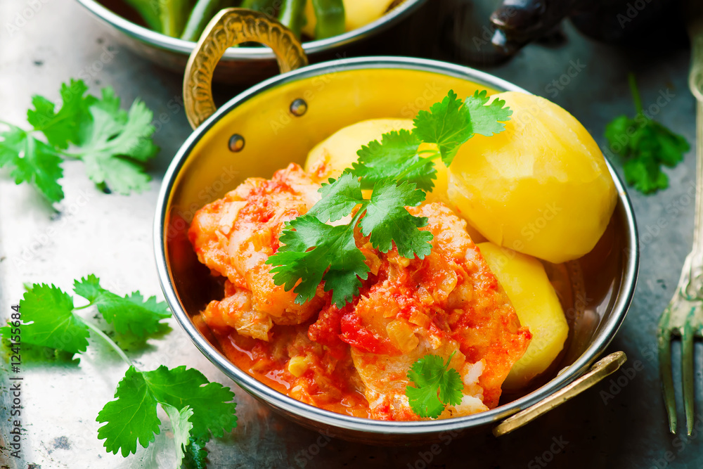 Poached Fish in Tomato Sauce StockFoto Adobe Stock