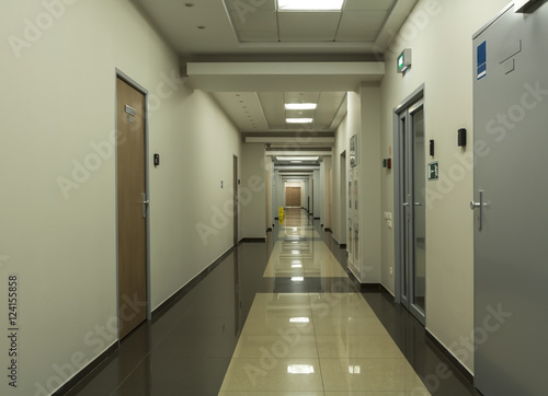 Empty long office corridor