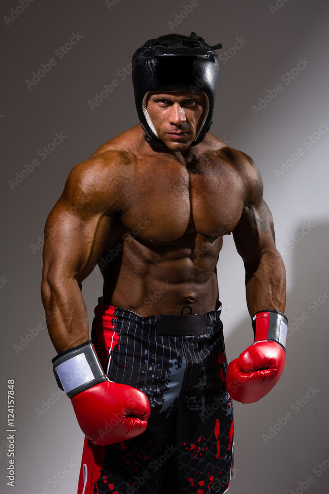 Portrait of young man with boxing helmet