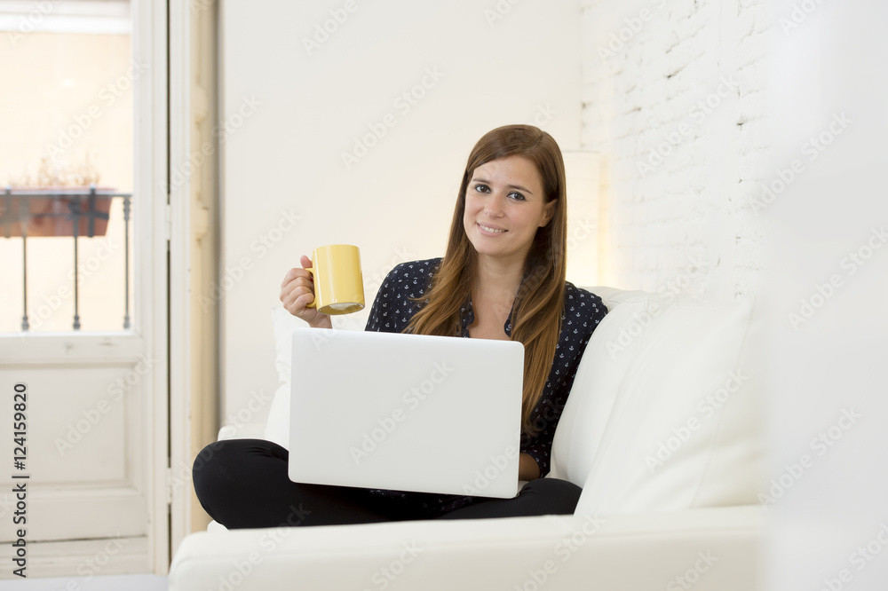 young beautiful woman working with laptop computer smiling happy or doing online internet shopping young beautiful woman working with laptop computer smiling happy or doing online internet shopping