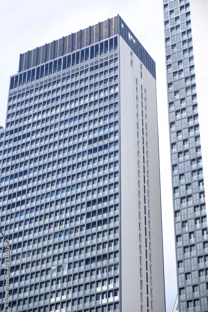 office buildings with glass facades in low angle view office buildings with glass facades in low angle view