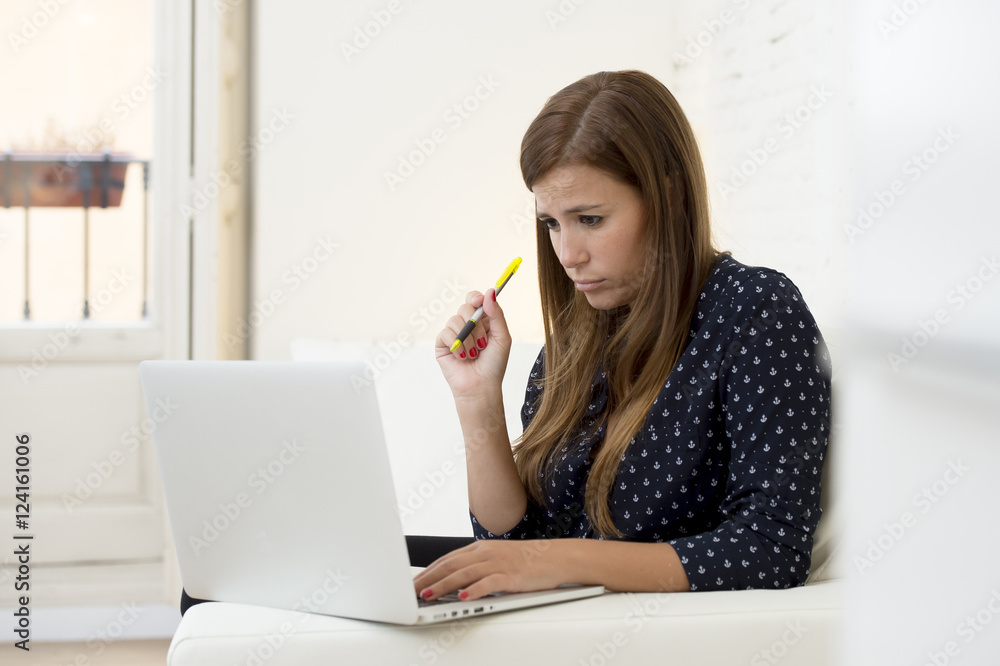 woman using laptop computer networking or online internet shopping at home couch woman using laptop computer networking or online internet shopping at home couch