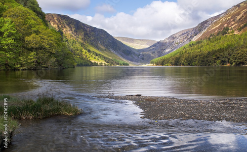 Glendalough upper lake lit up by the sun, ireland