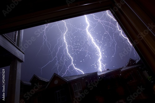 Lightening Storm Over Homes photo