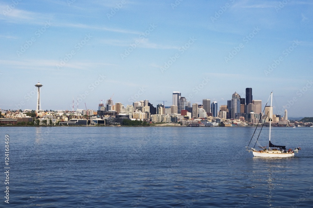 Seattle Skyline And A Sailboat In The Water; Seattle, Washington, United States Of America Seattle Skyline And A Sailboat In The Water; Seattle, Washington, United States Of America