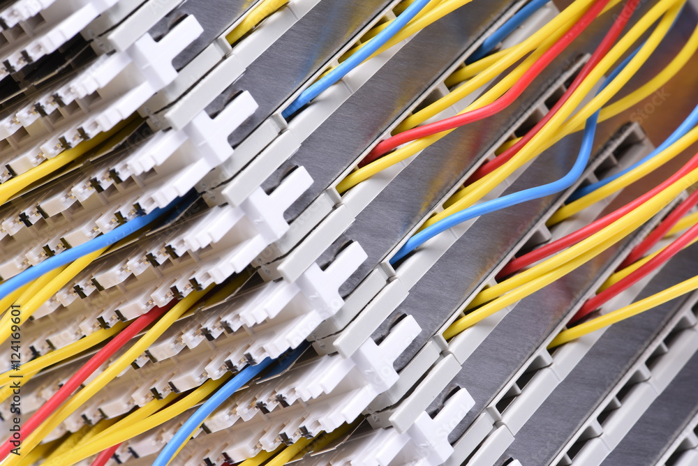 Telecommunication main distribution frame with colorful cables, close up Telecommunication main distribution frame with colorful cables, close up