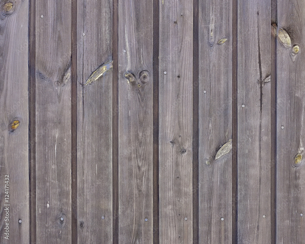 Fototapeta premium brown wood planks full of knobs background