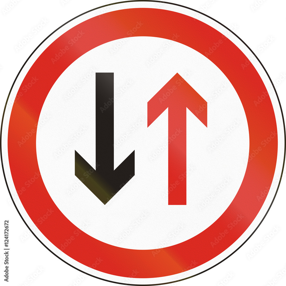 Hungarian regulatory road sign - Give way to oncoming traffic Hungarian regulatory road sign - Give way to oncoming traffic