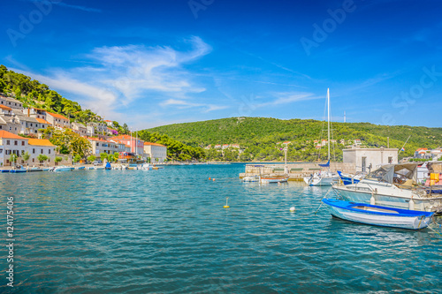 Pucisca mediterranean colorful bay. / View at mediterranean landscape in town Pucisca, Island Brac, popular touristic destination, Croatia Europe.