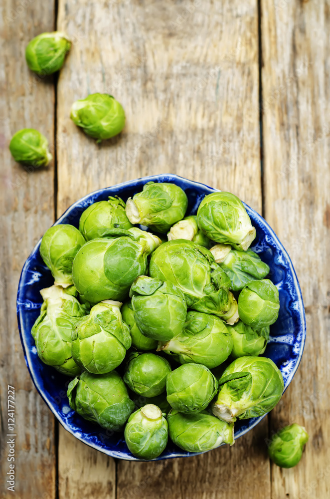 Brussels sprouts in a wooden bowl Brussels sprouts in a wooden bowl
