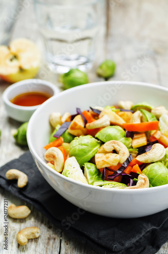 Brussels sprouts red cabbage carrot cashew apple salad with mapl