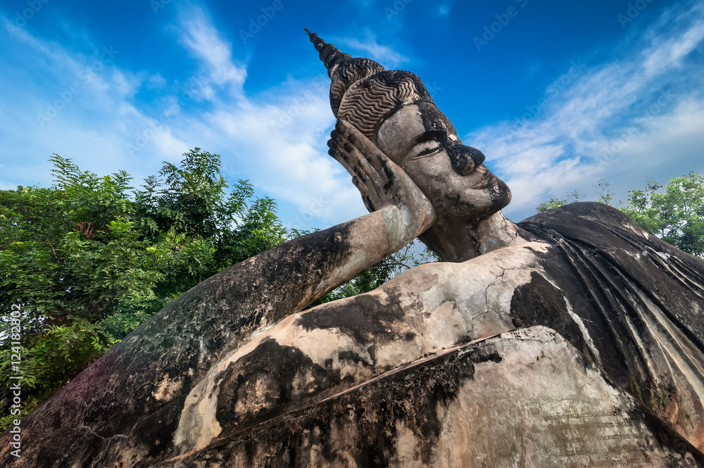 Fototapeta premium Amazing view of mythology and religious statues at Wat Xieng Khuan Buddha park. Vientiane, Laos