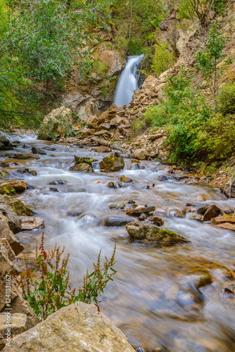 Waterfall in autumn forest at Vancouver, Canada. Hardy Falls, Okanagan Lake, Kelowna. photo