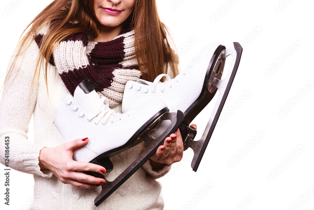 Fototapeta premium Smiling woman with ice skates