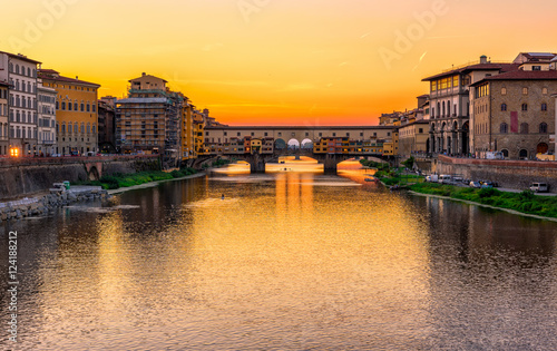 Sunset view of Ponte Vecchio over Arno River in Florence, Italy