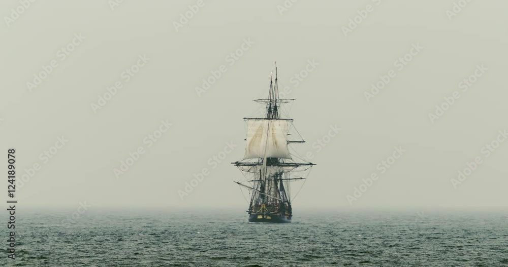 Wide shot of tall ship sailing in sea Wide shot of tall ship sailing in sea