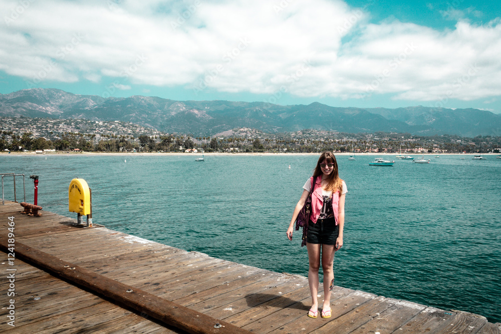 Girl at Santa Barbara pier in California